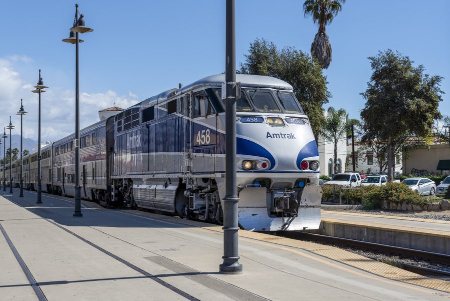 A passenger train crossing open country
